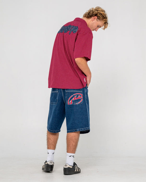 man-wearing-turbo-baggy-jort-in-deep-sea-blue