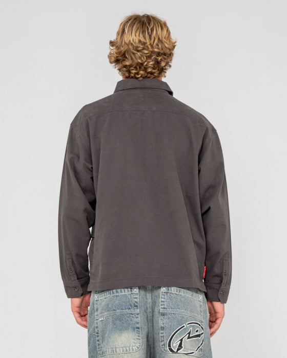 man-wearing-button-thru-over-shirt-in-coal