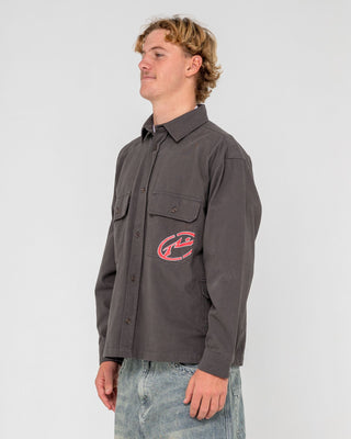 Man wearing Button Thru Over Shirt in Coal
