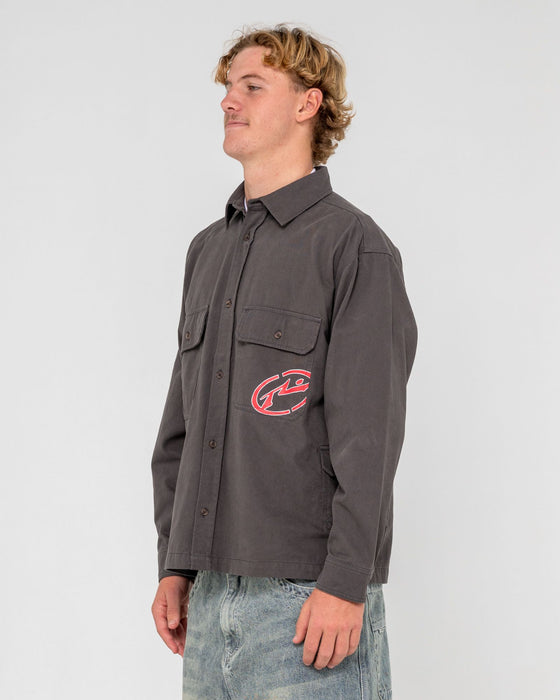 man-wearing-button-thru-over-shirt-in-coal