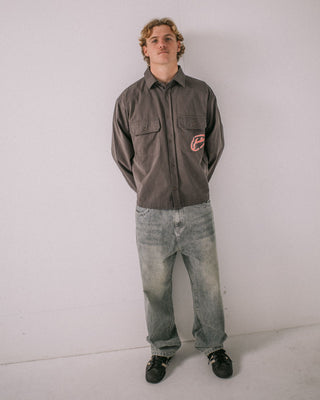 Man wearing Button Thru Over Shirt in Coal