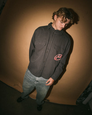 Man wearing Button Thru Over Shirt in Coal