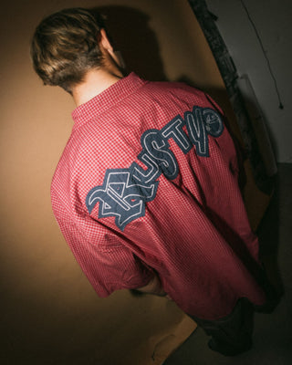 Man wearing Ransom Check Short Sleeve Shirt in Burgundy