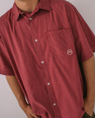 Man wearing Ransom Check Short Sleeve Shirt in Burgundy