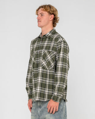 Man wearing Cobra Flannel Long Sleeve Shirt in Army Green
