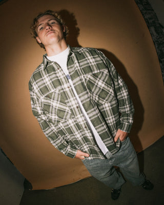 Man wearing Cobra Flannel Long Sleeve Shirt in Army Green