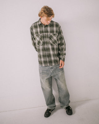 Man wearing Cobra Flannel Long Sleeve Shirt in Army Green