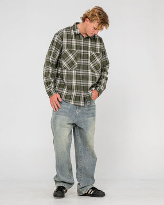 Man wearing Cobra Flannel Long Sleeve Shirt in Army Green