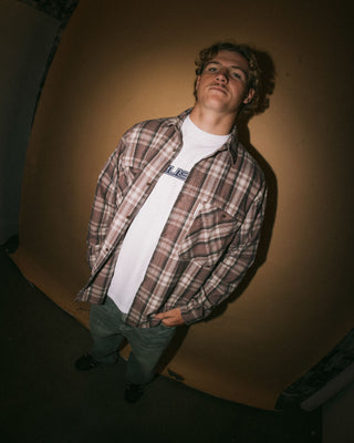 Man wearing Cobra Flannel Long Sleeve Shirt in Purple Ash