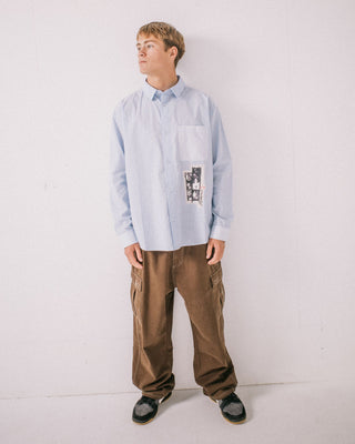 Man wearing Trife Life Long Sleeve Shirt in Sky Blue