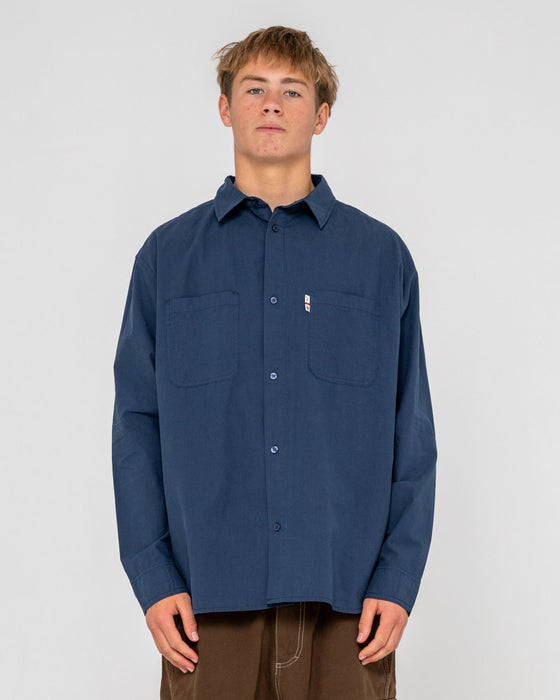 man-wearing-northpoint-plaid-panel-l-s-shirt-in-navy-blue