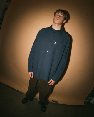 Man wearing Northpoint Plaid Panel L/S Shirt in Navy Blue