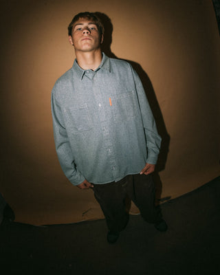 Man wearing Tombstones Long Sleeve Shirt in Dirty Dawg