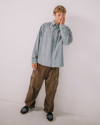 Man wearing Tombstones Long Sleeve Shirt in Dirty Dawg