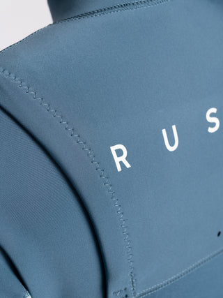 Women wearing A Series Ecoprene 3/2 Chest Zip Long Sleeve Steamer Wetsuit in Crystal Blue