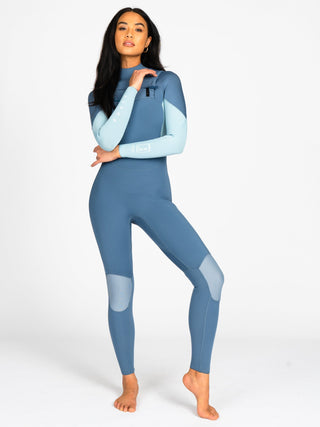 Women wearing A Series Ecoprene 3/2 Chest Zip Long Sleeve Steamer Wetsuit in Crystal Blue