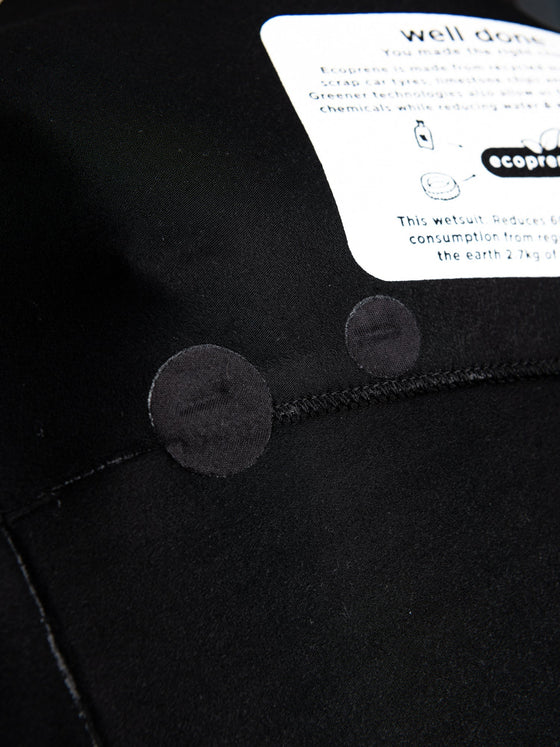 man-wearing-wearing-a-series-ecoprene-2-chest-zip-short-sleeve-wetsuit-in-black