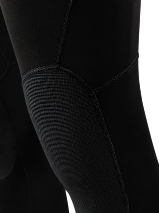 man wearing  wearing A Series Ecoprene 2 Chest Zip Short Sleeve Wetsuit in Black