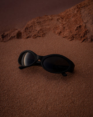 Man and woman wearing UFO Sunglasses in Matte Black