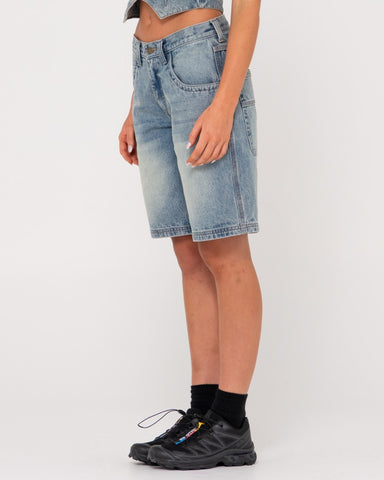 Woman wearing Flip Mommy Tapeless Low Rise Denim Short in Dirty Dawg