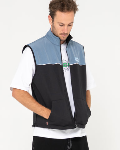 Man wearing Tekkers Unisex Fleece Vest in Coal