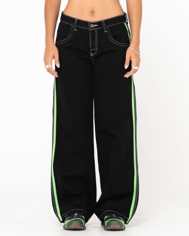 Woman wearing Flip Mommy Low Rise Wide Leg Denim Pant in Black Out/classic Green