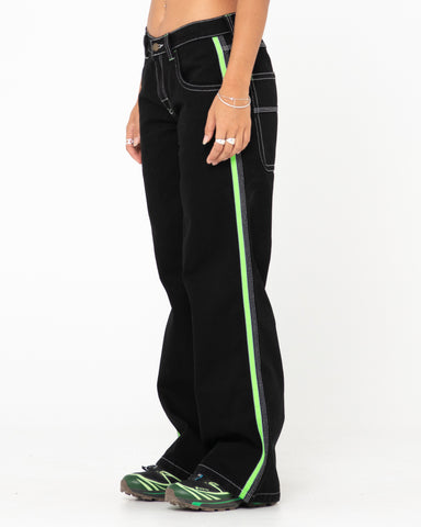 Woman wearing Flip Mommy Low Rise Wide Leg Denim Pant in Black Out/classic Green