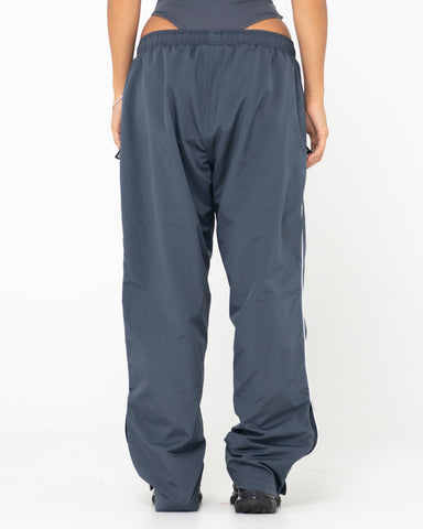 Woman wearing First Touch Unisex Track Pants in Coal