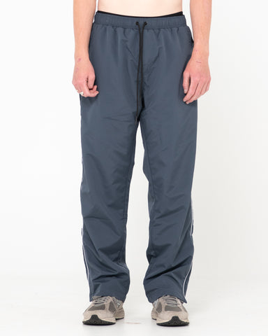 Man wearing First Touch Unisex Track Pants in Coal
