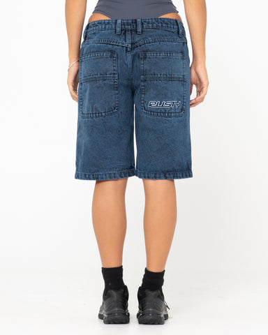 Woman wearing Flip Mommy Tapeless Low Rise Denim Short in Overdyed Blue