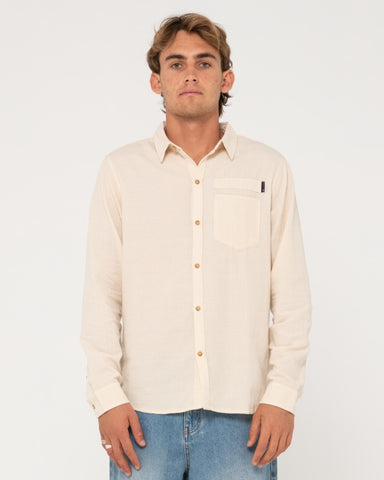 Man wearing Yuma Linen Long Sleeve Shirt in Vintage Cream