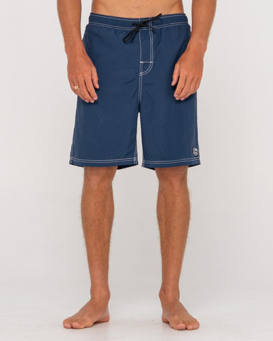 Man wearing Heritage 95 All Day Short in Navy Blue
