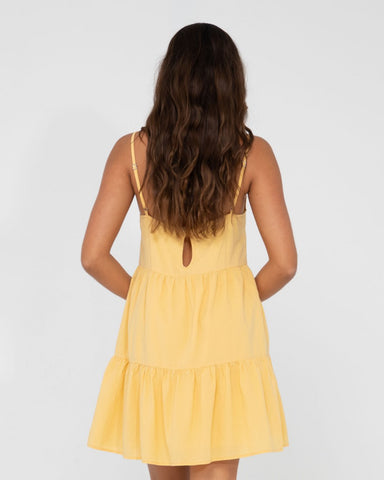 Woman wearing Heather Slip Dress in Pineapple