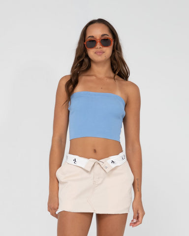 Woman wearing Amelia Strapless Knit Top in Periwinkle Blue