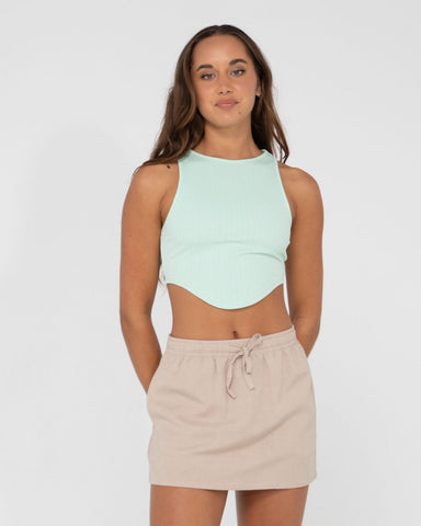 Woman wearing Lucy Curved Crop Tank in Fresh Mint