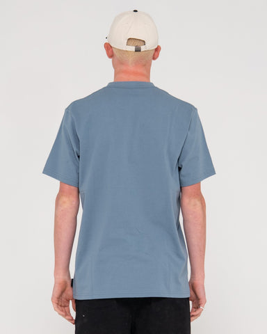 Man wearing Shadow R Short Sleeve Tee in China Blue/blue Glas