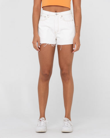 Woman wearing Penny Kick Flare Denim Short in White