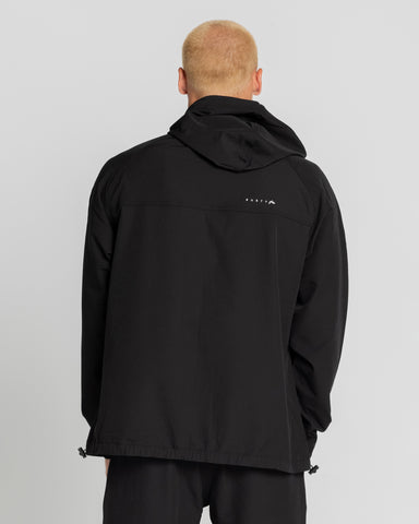 Man wearing Trainer Shell Jacket in Black Stealth