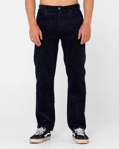 Man wearing Rifts 5 Pkt Pant in Navy Blue