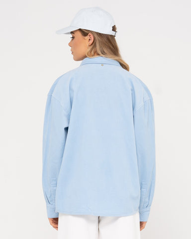 Woman wearing Lana Mini Cord Shirt in Blue Bell