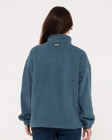 Woman wearing Central Division Crew Polar Fleece in China Blue