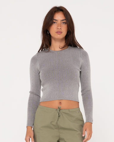 Woman wearing Solace Long Sleeve Knitted Top in Grey Cloud