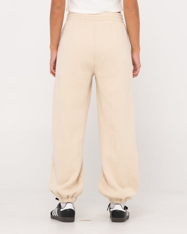 Woman wearing Rusty Signature Oversize Trackpant in Cream