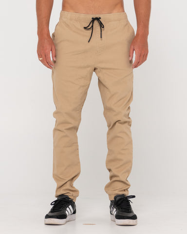 Man wearing Hook Out Elastic Pant in Khaki