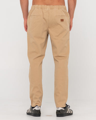 Man wearing Mid Boy Straight Fit Elastic Pant in Khaki
