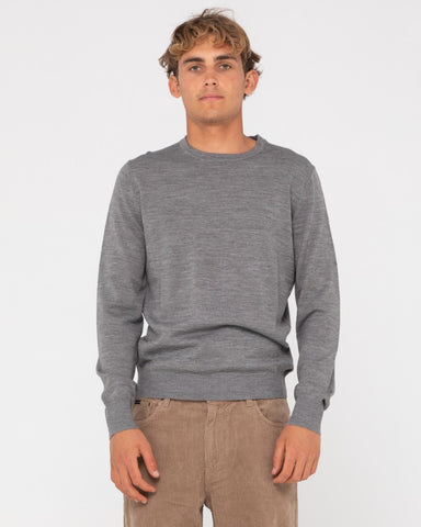 Man wearing Slung Lightweight Wool Crew Knit in Grey Marle
