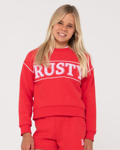 Girl wearing Rusty Line Oversize Crew Fleece Girls in Radiant Red