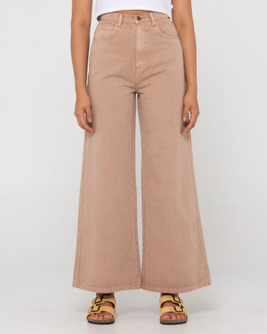 Woman wearing Hansen High Waisted Pant in Taupe