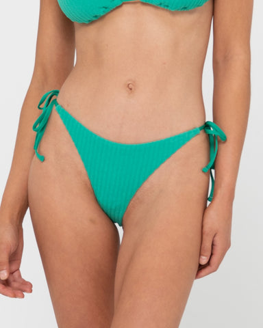 Woman wearing Lucky Brazilian Side Ties Bikini Pant in Green