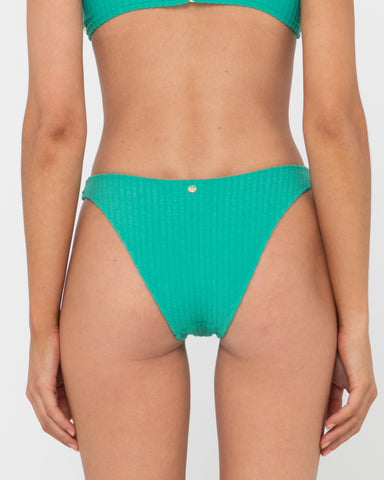Woman wearing Lucky Midi Bikini Pant in Green